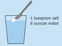 Salt water rinse solution with 1 teaspoon salt and 8 ounces water for orthodontic care.